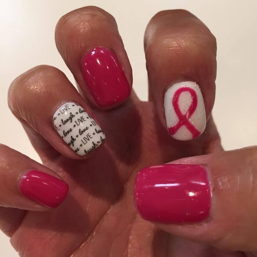 Deep pink gel manicure with pink ribbon and lace nail art at Northpark Mall nail salon OKC