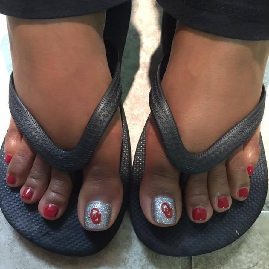 Red pedicure with hand-painted accent toe, summer sandal pedicure in Oklahoma City