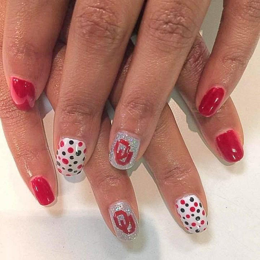 Red gel manicure with white polka dot accent nails, nail art near Nichols Hills OK